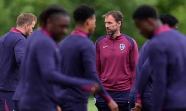 Gareth Southgate with some of his players during training