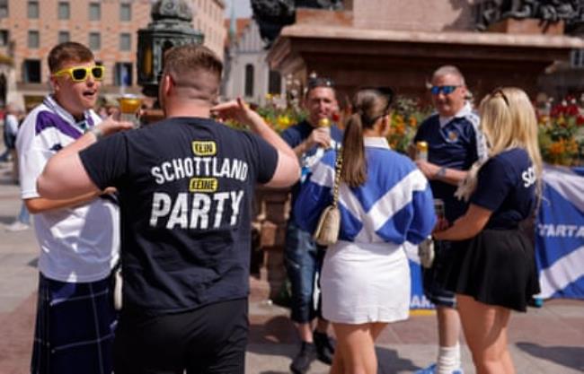 Scottish fans pack into Marienplatz outside the town hall in the centre of Munich.