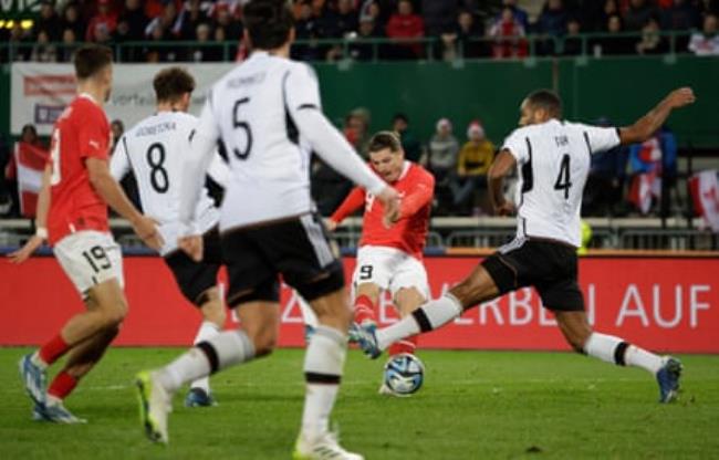 Marcel Sabitzer fires in Austria’s first goal in their 2-0 friendly win against Germany in November 2023.