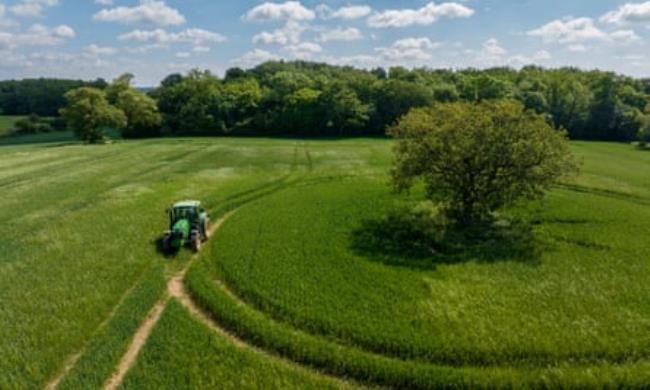 Aerial image of Watts in a tractor on his farm in Puckeridge.