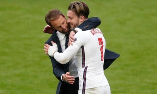 Gareth Southgate celebrates with Jack Grealish after England’s win over Germany in 2021
