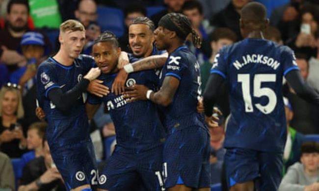 Christopher Nkunku celebrates after scoring Chelsea’s second goal against Brighton with Cole Palmer, Malo Gusto and Noni Madueke.