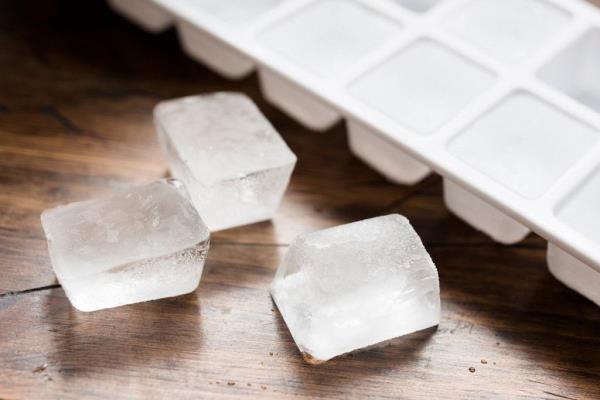 Ice cubes are great for reducing swelling around the eyes