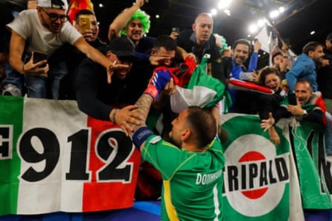 Goalkeeper Gianluigi Do<em></em>nnarumma of Italy celebrates with fans after their victory over Albania during the Euro 2024 group game between Italy and Albania.