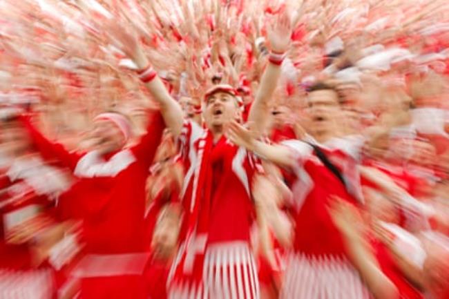 Danish fans cheer their team during the Euro 2024 European Champio<em></em>nship group game between England and Denmark.
