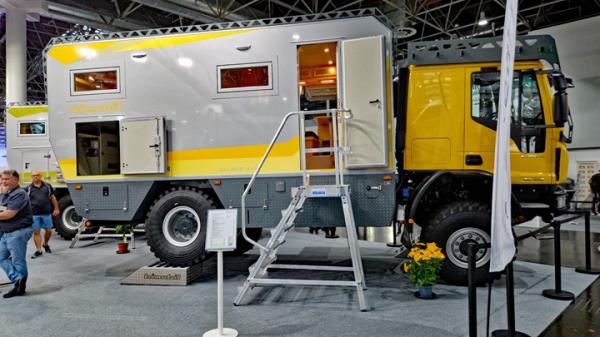 2023 Dusseldorf Caravan Salon - Bimobile Iveco off-road RV, side with aircraft stepladder