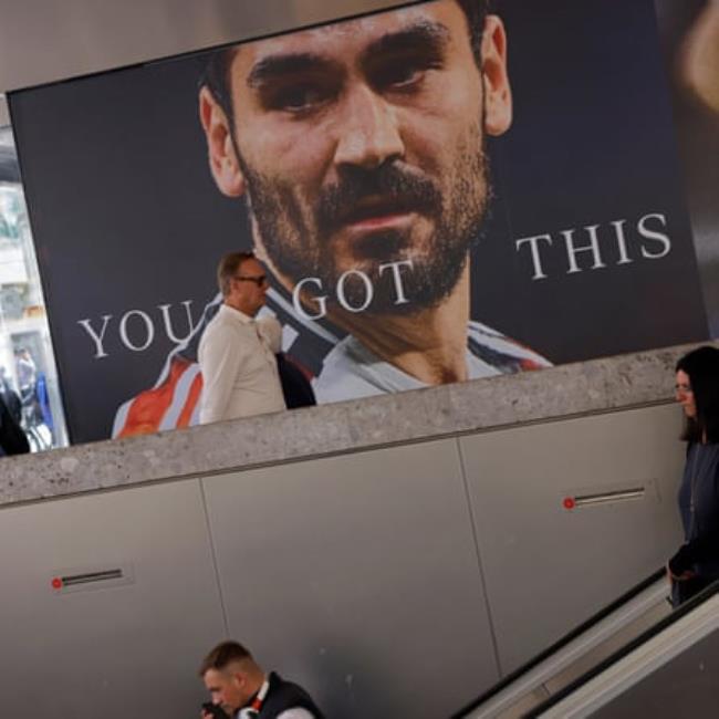 An advert showing Germany captain Ilkay Gundogan in the centre of Munich.