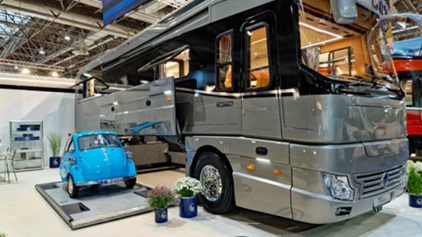 2023 Dusseldorf Caravan Salon - premium RV with Mazda MX-5 in garage