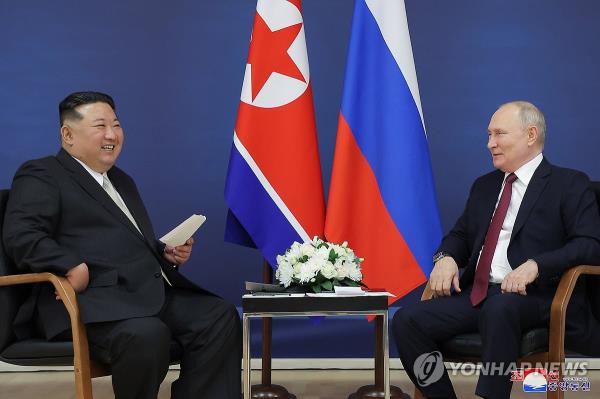 This file photo, carried by the North's official Korean Central News Agency on Sept. 14, 2023, shows its leader Kim Jong-un (L) and Russian President Vladimir Putin holding a summit at Russia's Vostochny spaceport the previous day. (For Use o<em></em>nly in the Republic of Korea. No Redistribution) (Yonhap)