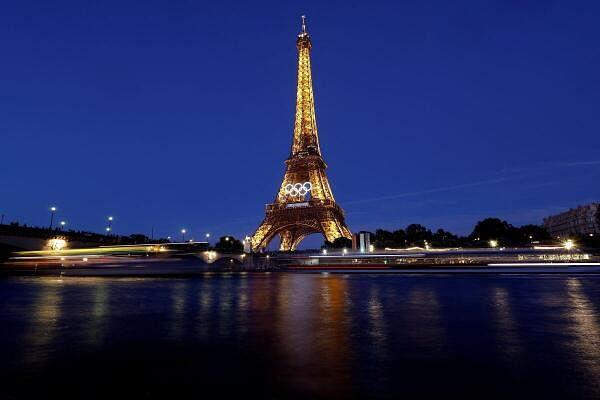 The Olympic rings displayed on the first floor of the Eiffel Tower.