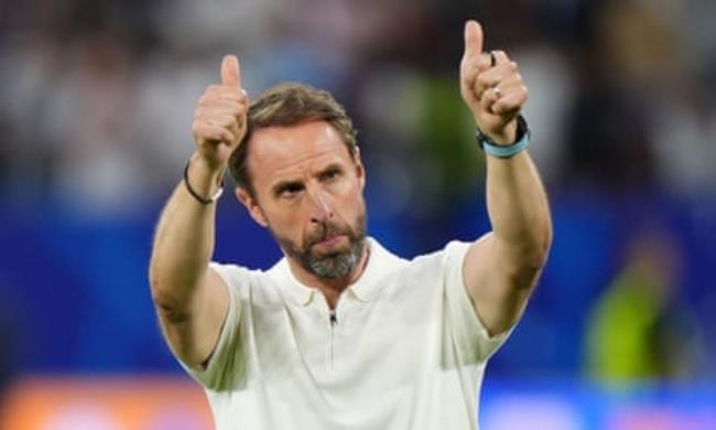 Gareth Southgate gestures towards the fans after the game