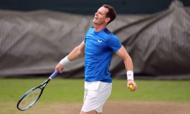 Andy Murray winces during practice at Wimbledon 