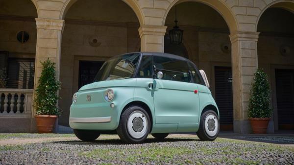 Fiat Topolino Dolce Vita: rear three quarter static, sunset, blue paint