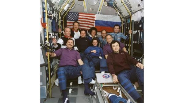 Three years later, during the historic STS-71 mission, 10 people orbited the Earth on July 4, 1995, as the space shuttle docked with the Mir space station for the first time.