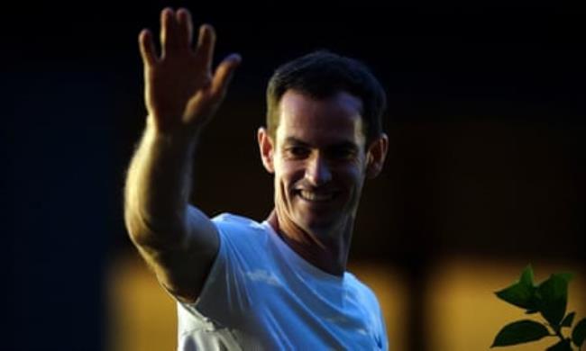 Andy Murray waves to fans outside Centre Court after his doubles defeat