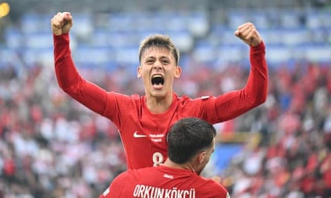 Arda Guler and Orkun Kokcu celebrate during the Euro 2024 group stage match between Turkey and Georgia in Dortmund, Germany