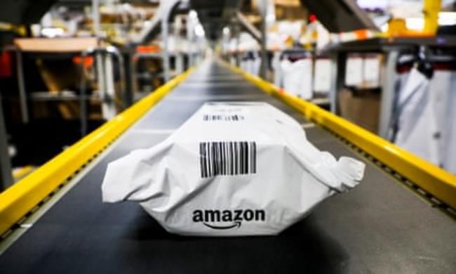 An Amazon package on a co<em></em>nveyor belt