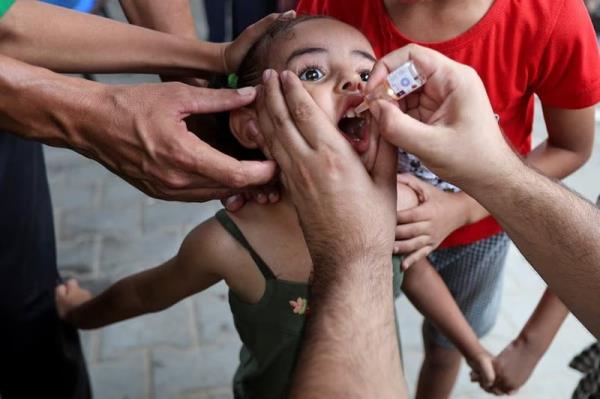 A Palestinian girl is vaccinated against polio, at a United Nations healthcare center in Deir Al-Balah in the central Gaza Strip, September 1, 2024. PHOTO: REUTERS