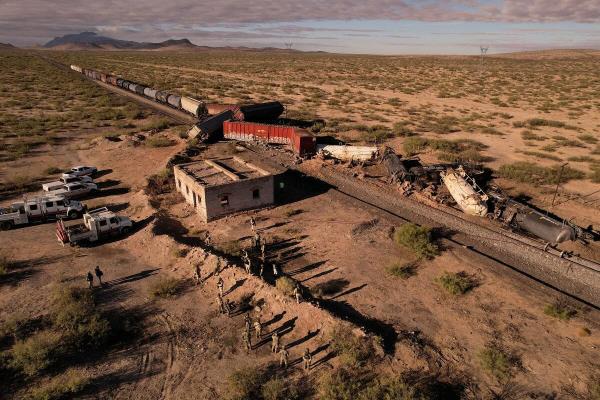 A drone view shows members of the Mexican army and railway workers searching for a missing child after a train derailment that resulted in several injured migrants, on the outskirts of Ciudad Juarez, Mexico September 4, 2024.