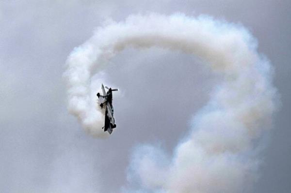 Polish pilot Artur Kielak showing an aerial maneuver during the 2O19 Košice Aviation Days.