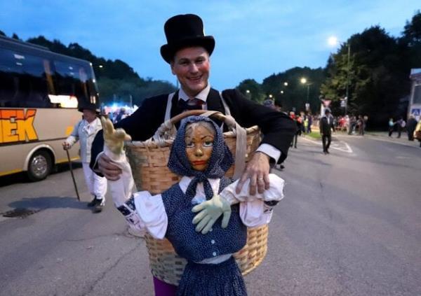 The famous Salamander Procession features hundreds of participants in costumes.