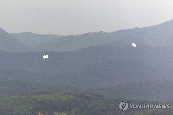 Seen from an observation point at Mount Odu in the South Korean border city of Paju on Sept. 5, 2024, balloons are being launched from the North Korean border county of Kaepung. (Yonhap) 