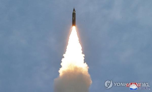 This undated file photo, released by the Korean Central News Agency, shows the North co<em></em>nducting a ballistic missile launch. (For Use o<em></em>nly in the Republic of Korea. No Redistribution) (Yonhap)