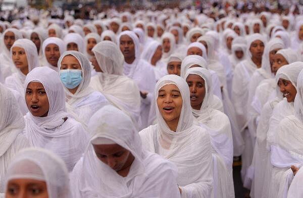 Ethiopian Orthodox choir members sing during the Meskel festival, a celebration to commemorate the discovery of the True Cross on which Jesus Christ was crucified, in Addis Ababa, Ethiopia.