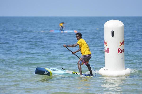 Surfer Sekar Patchai in action during Natio<em></em>nal Stand-Up Paddle Championship, at Rameshwaram, in Ramanathapuram district, Tamil Nadu, Saturday, Sept 28, 2024. 