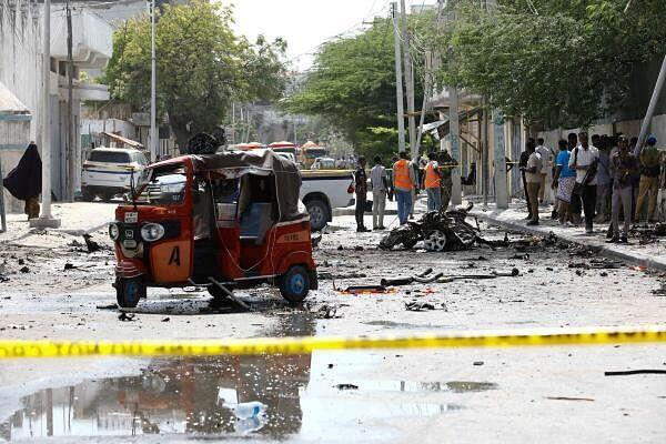 Somali security officers cordon off the area of the wreckage of a rickshaw at the scene of an explosion on a bomb-rigged car that was parked on a road near the Natio<em></em>nal Theatre in Hamarweyne district of Mogadishu, Somalia September 28, 2024.