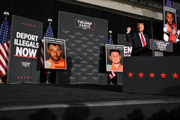 AURORA, COLORADO - OCTOBER 11: Former President Do<em></em>nald J. Trump holds a campaign rally at Gaylord Rockies Resort in Aurora, Colorado on October 11, 2024. The Republican presidential nominee spoke at a hotel co<em></em>nvention center to a large crowd of around ten thousand people on the outskirts of Aurora making good on an earlier promise to visit the city he has labeled a war zone. On the debate stage; he made a statement a<em></em>bout Venezuelan gang members taking over the city. (Photo by RJ Sangosti/The Denver Post)