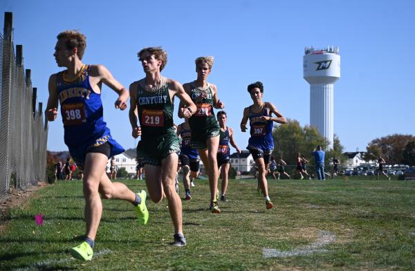 Runners compete in the boys varsity race during the Carroll County cross country champio<em></em>nships at McDaniel College on Tuesday. (Brian Krista/Staff)