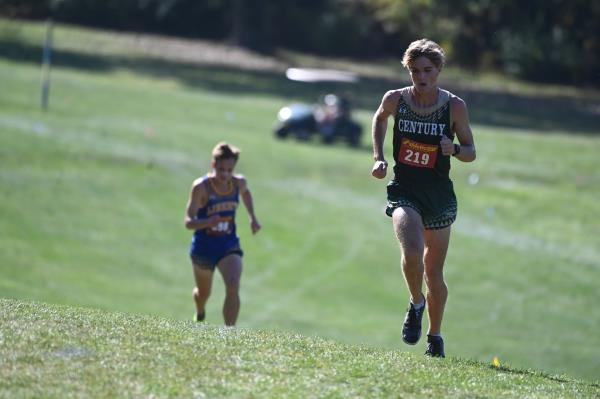 Century's Ryan Hartranft leads the field in the boys varsity race during the Carroll County cross country champio<em></em>nships at McDaniel College on Tuesday. (Brian Krista/Staff)