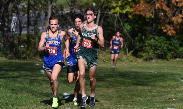 Runners, from left, Liberty's Neal Sanchez, Manchester Valley's Logan Amis and Century's Thomas Sewell compete in the boys varsity race during the Carroll County cross country champio<em></em>nships at McDaniel College on Tuesday. (Brian Krista/Staff)