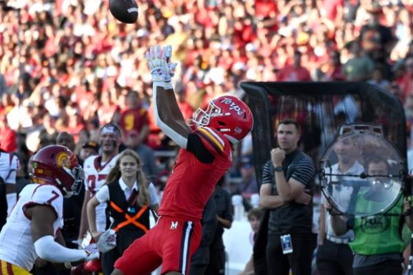 vs Maryland WR Kaden Prather goes up for the ball as Kamari Ramsey, USC safety, applies pressure resulting in an incomplete pass the first half of college football at SECU Stadium. (Kim Hairston/Staff)