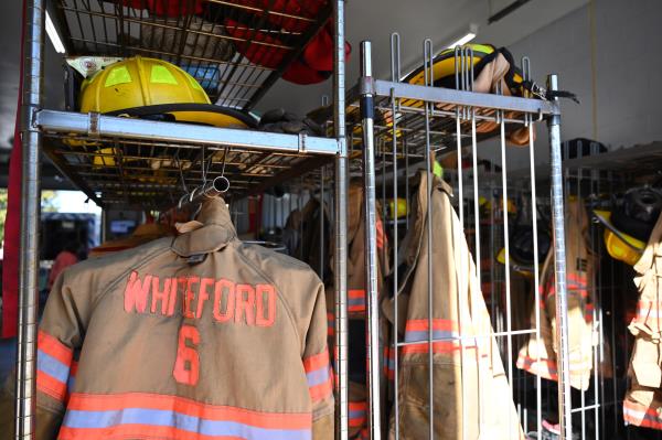 Firefighters turnout gear on display during an open house at Whiteford Volunteer Fire Company on Saturday. (Brian Krista/staff photo)