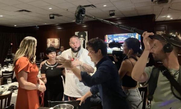 A French new<em></em>lineary film crew captures Jantz and attendees of the Palm Beach County Republican Party debate watch party at Uncle Eddie's Ristorante.