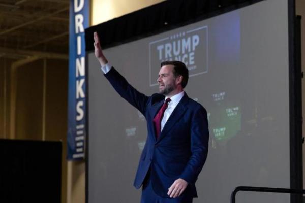 FILE - Republican vice presidential nominee Sen. JD Vance, R-Ohio, greets the audience at a campaign town hall at the Mo<em></em>nroeville Co<em></em>nvention Center in Monroeville, Pa., Sept. 28, 2024. (AP Photo/Rebecca Droke, file)