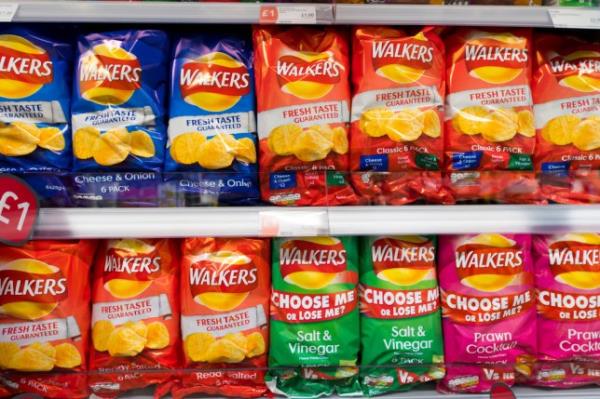 A photo of Walkers crisp packets in supermarket