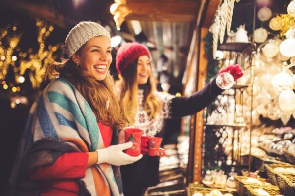 Girl friends havin<em></em>g fun and enjoying on Christmas market