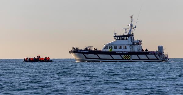 Caption: British rescuers saving migrants in ?grave danger? under shadow of French boats
