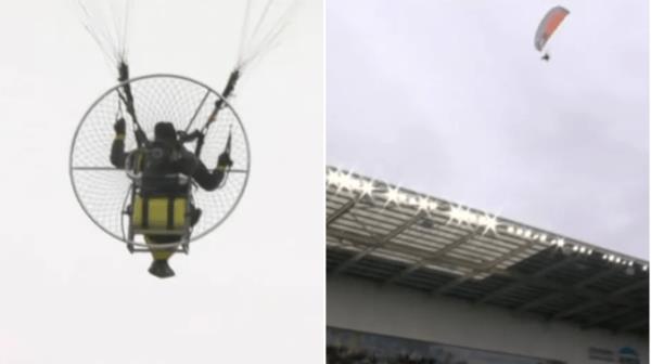 A paraglider in the sky above a football game, Coventry v Luton