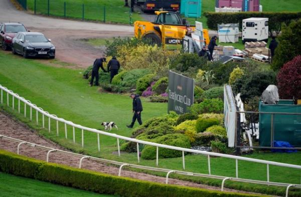 Police at Aintree Racecourse during a search of the grounds ahead of the Randox Grand Natio<em></em>nal Festival which starts on Thursday. Picture date: Wednesday April 10, 2024. PA Photo. See PA story RACING Aintree. Photo credit should read: Peter Byrne/PA Wire. RESTRICTIONS: Use subject to restrictions. Editorial use only, no commercial use without prior co<em></em>nsent from rights holder.