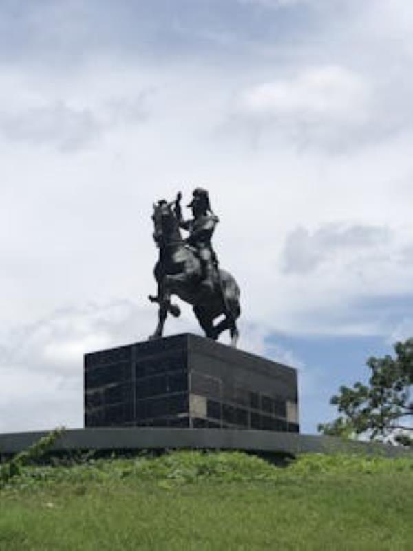 A statue of a man on horseback.