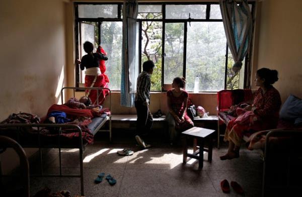 Women with babies in a Nepalese clinic.