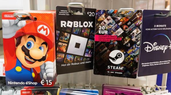 A selection of video game gift cards for Xbox, Roblox, and Nintendo