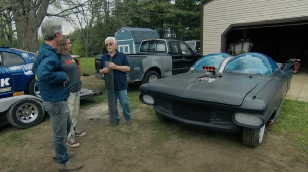 Rick Klibenski discussess his Ultimus bubble car with American Pickers hosts Mike Wolfe and Danielle Colby