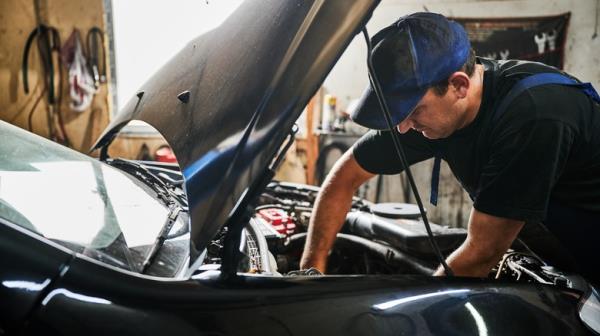 Mechanic working on a car