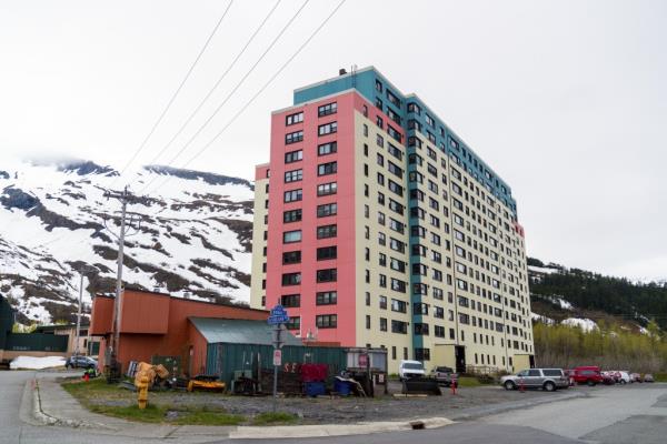 General view of the Begich Towers in Whittier, Alaska, housing the town's amenities such as police station, doctor's office, and school.