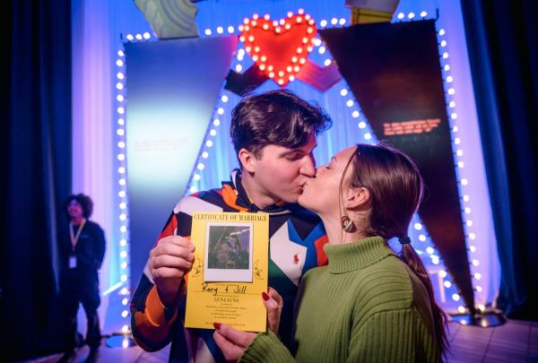 Rory Dwyer and Jill Cavanaugh kiss.